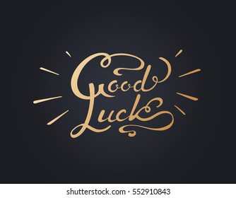 Golden Good Luck Hand Drawing Lettering isolated on black background. Vector template for greeting card design.