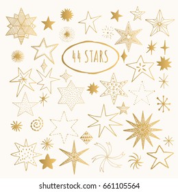 Golden hand drawn stars. Vector.