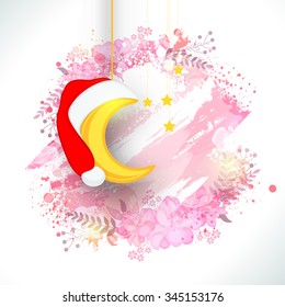 Golden hanging moon in Santa cap and stars on beautiful flowers decorated background for Merry Christmas celebration.