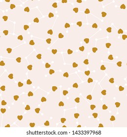 Golden hearts and celestial elements in a seamless pattern design. Vector repeated pattern, that can be used both on the web or in print, for surface design.