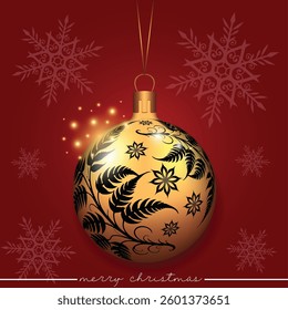 A golden holiday ornament featuring an intricate floral design on a festive red background.