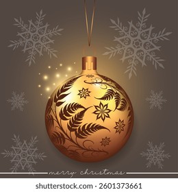 A golden holiday ornament featuring an intricate floral design on a festive background.