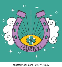 Golden horseshoe amulet. A good luck charm. A design element. Lucky St. Patrick's day symbol. Vector image in doodle style.