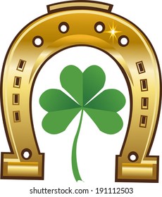 Golden horseshoe and four leaf clover - lucky symbol