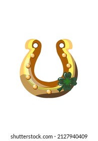 Golden horseshoe for good luck with green leaf clover for St. Patrick's day.