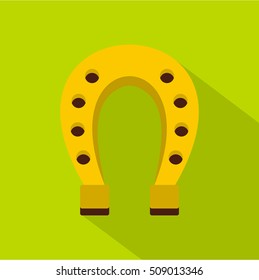Golden horseshoe icon. Flat illustration of golden horseshoe vector icon for web isolated on green background