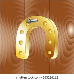 golden horseshoe symbol of wealth and good luck