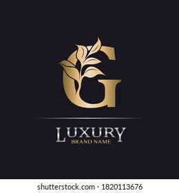Golden Initial Letter G. Elegant design letter G with floral branch. Luxury Gold Logo Icon. Vintage alphabet concept with floral ornate for monogram, initial, heraldy, logo, business, wedding card.