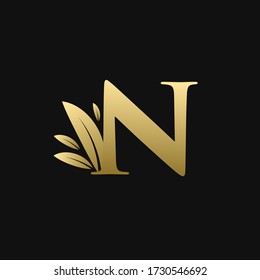 Golden Initial Letter N Leaf Logo