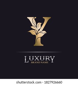 Golden Initial Letter Y. Elegant design letter U with floral branch. Luxury Gold Logo Icon. Vintage alphabet concept with floral ornate for monogram, initial, heraldy, logo, business, wedding card.