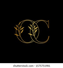Golden initial O and C, OC, CO letter logo icon, outline vintage design concept classic nature leaves with letter gold color.