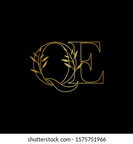 Golden initial Q and E, QE, EQ letter logo icon, outline vintage design concept classic nature leaves with letter gold color.