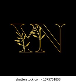 Golden initial  Y and N, YN, NY letter logo icon, outline vintage design concept classic nature leaves with letter gold color.