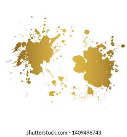 Golden Ink blot splashing on white background. A drop of ink, diffuse spots.