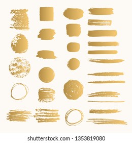 Golden ink shapes with rough edges. Glitter paint stroke.