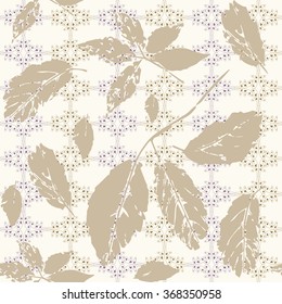 Golden intricate seamless pattern with leaves of wild grape stylized as stamp or imprint; rustic or boho style. May be used for textile, wrapping paper or in scrapbooking