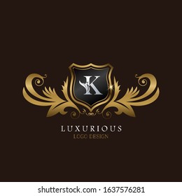 Golden  K Logo Luxurious Shield, creative vector design concept for luxury business indentity.