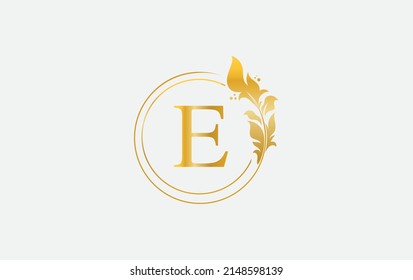 Golden leaf and circle logo design vector. Golden beauty and business symbol and alphabets vector design
