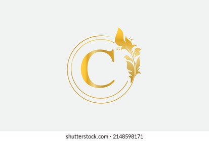 Goldenes Blatt und kreisförmige Logo-Design-Vektorgrafik. Goldenes Schönheits- und Geschäftssymbol und -alphabeten, Vektordesign