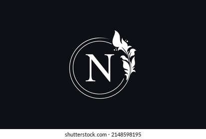 Golden leaf and circle logo design vector. Golden beauty and business symbol and alphabets vector design