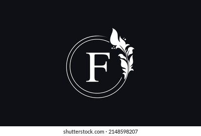 Vector de diseño de la hoja de oro y el logotipo de círculo. Diseño vectorial de la belleza dorada y el símbolo de negocios y el alfabeto
