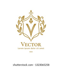 Golden leaf emblem. Elegant, classic vector. Can be used for jewelry, beauty and fashion industry. Great for logo, monogram, invitation, flyer, menu, brochure, background, or any desired idea.