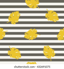 Golden leaf on black and white striped background. Modern natural seamless pattern. Great for surface design, wrapping paper, fabric printing