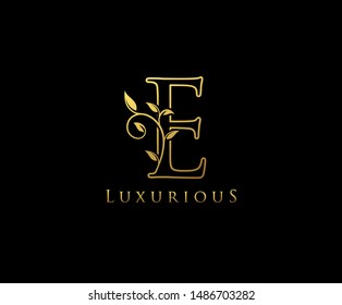 Golden Letter E Logo Icon . Initial Letter E Design Vector Luxury Gold Color.Print monogram initials stamp line art sign symbol.