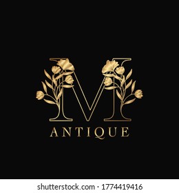 Golden Letter M Luxury Flowers Initial Logo Template Design. Monogram antique ornate nature floral leaf with initial letter.