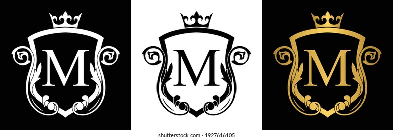 Golden Letter M template logo Luxury shield letter with crown. Monogram alphabet . Beautiful royal initials letter.