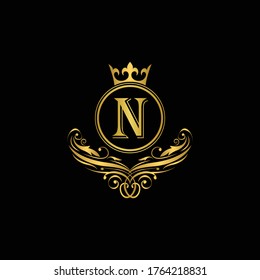 Golden letter N logo Luxury letter with crown.  Monogram alphabet . Beautiful royal initials letter. template logo for design 
