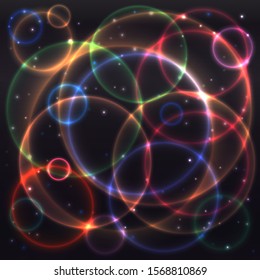 Golden light circle gradient abstract on black background, yellow starry night effect frame, lighting dotted dark wallpaper, colorful party sparkle banner.