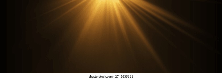 Golden light rays shining from top corner on dark black background