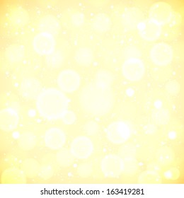 Golden lights blurred background with bokeh effect