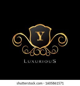 Golden Luxurios Letter Y logo, elegance vector design concept Shield  shape with initial letter.