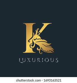 Golden Luxurious Initial Letter K Logo, Vector design ornate swirl nature floral concept for luxury brand identity.