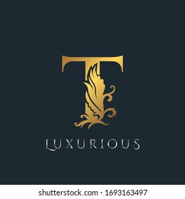 Golden Luxurious Initial Letter T Logo, Vector design ornate swirl nature floral concept for luxury brand identity.