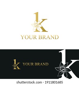 Golden Luxury Initial letter k with March Daffodils narcissus flower for cosmetic, Jewelry, boutique, hotel logo concept vector