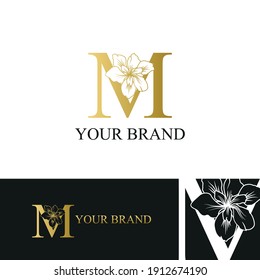 Golden Luxury Initial letter M with February Iris flower for cosmetic, Jewelry, boutique, hotel, resort, florist, beauty spa salon logo concept vector	