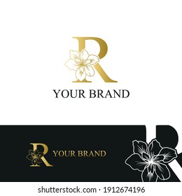 Golden Luxury Initial letter R with February Iris flower for cosmetic, Jewelry, boutique, hotel, resort, florist, beauty spa salon logo concept vector	