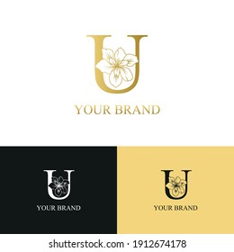 Golden Luxury Initial letter U with February Iris flower for cosmetic, Jewelry, boutique, hotel, resort, florist, beauty spa salon logo concept vector	