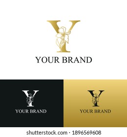 Golden Luxury Initial letter Y with February Iris flower for cosmetic, Jewelry, boutique, hotel logo concept vector