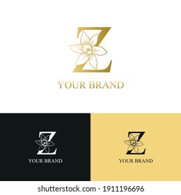 Golden Luxury Initial letter Z with March Daffodils narcissus flower for cosmetic, Jewelry, boutique, hotel logo concept vector