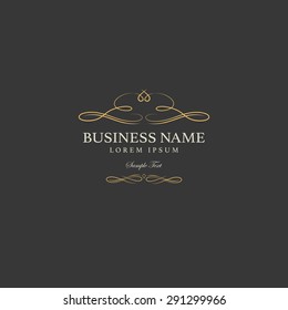 Golden Luxury Logo with flourishes. Elegant design.