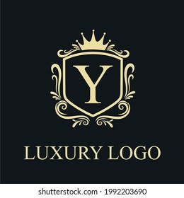 Golden Luxury Y Initial Letter Logo Design Template with Shield and Floral Vintage Ornament for Royalty, Wedding, Restaurant, Salon, Boutique, Cafe, Hotel, Heraldic, Jewelry, Fashion Business Brand