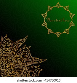 Golden mandala on a green background