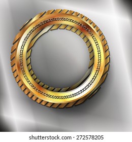 The golden metallic ring on the metallic background