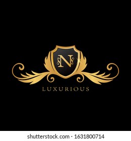 Golden N Logo  Luxurious  Shield vector design concept.