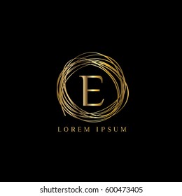 Golden nest vector logo. Letter E