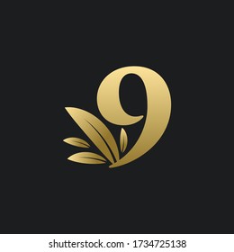 Golden Number Nine logo with gold leaves. Natural number 9 logo with gold leaf.